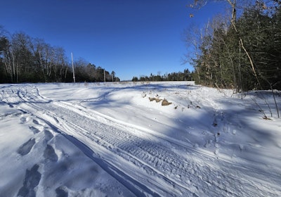 Snowmobile trail near west line just off property