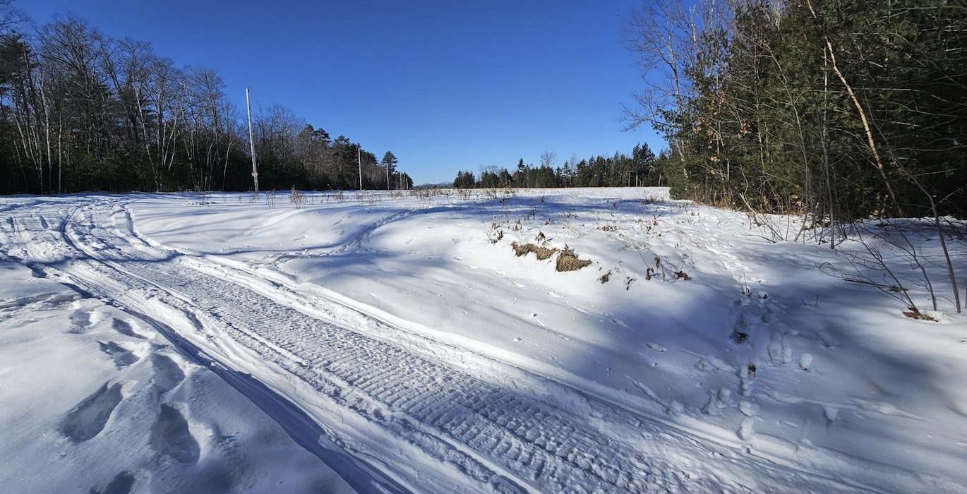 Snowmobile trail near west line just off property