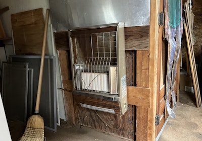 Heated outhouse